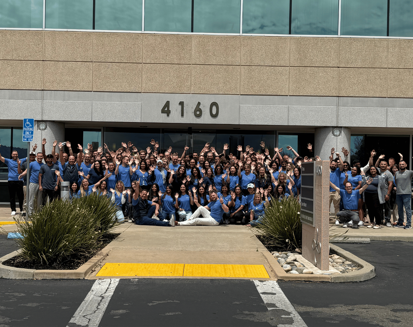 The SavvyMoney Team Outside Corporate Headquarters Celebrating 1500 Partners