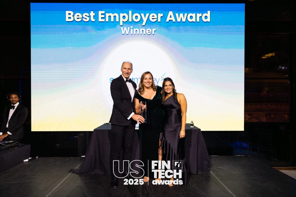 David Dowhan, Sara Portis, and Corissa Dubord accepting the Best Employer award at the US FinTech Awards in New York