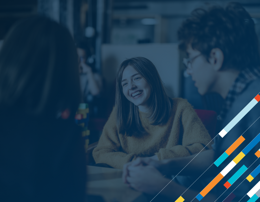 August Blog Featured Image Gen Z Still Banks With You, But Their Loans Don't. Gen Z Group of Students Smiling.